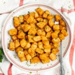 This is a picture of a plate filled with air fryer diced potatoes.