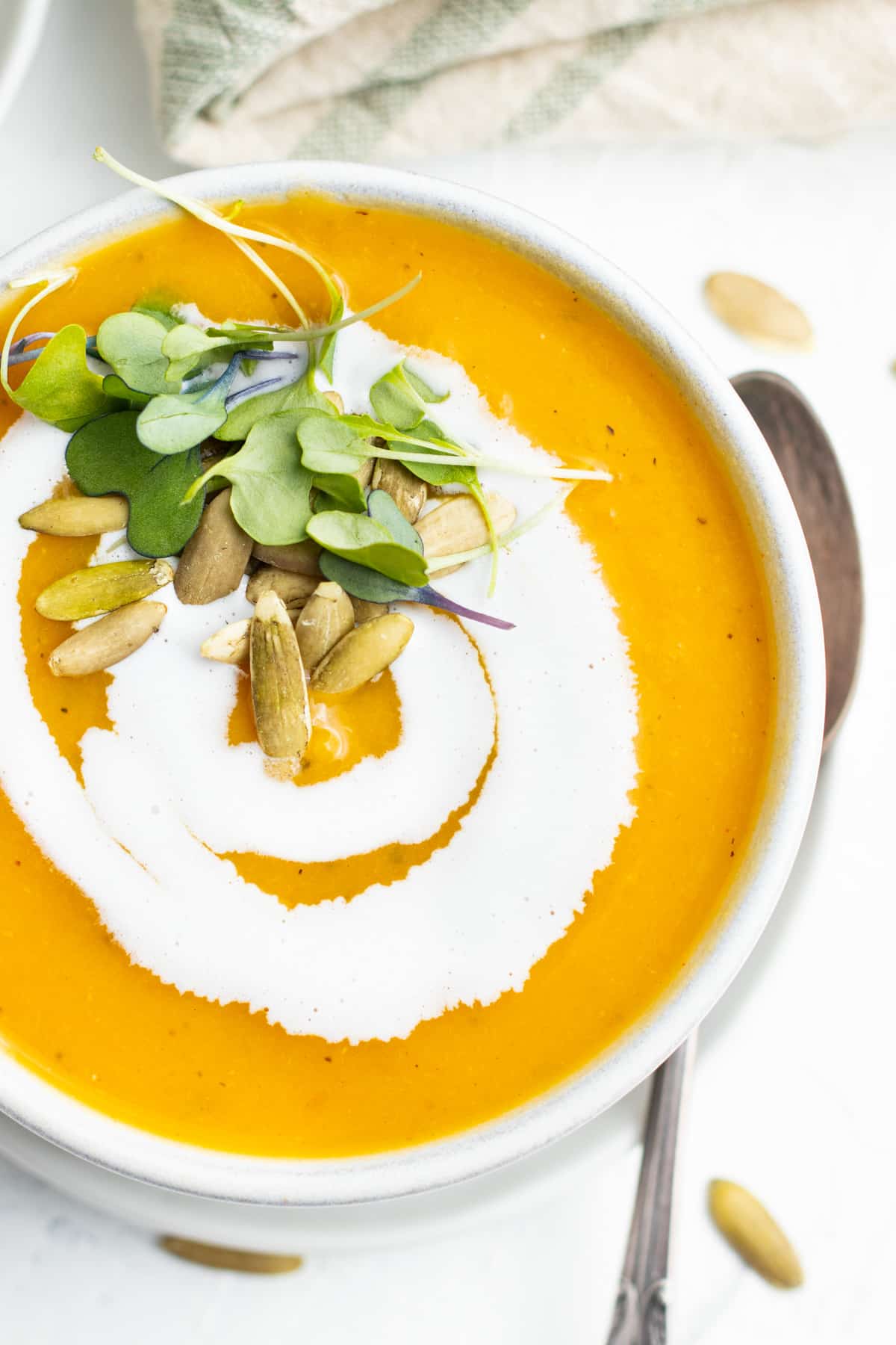 Close up picture of bowl of butternut squash leek soup. 