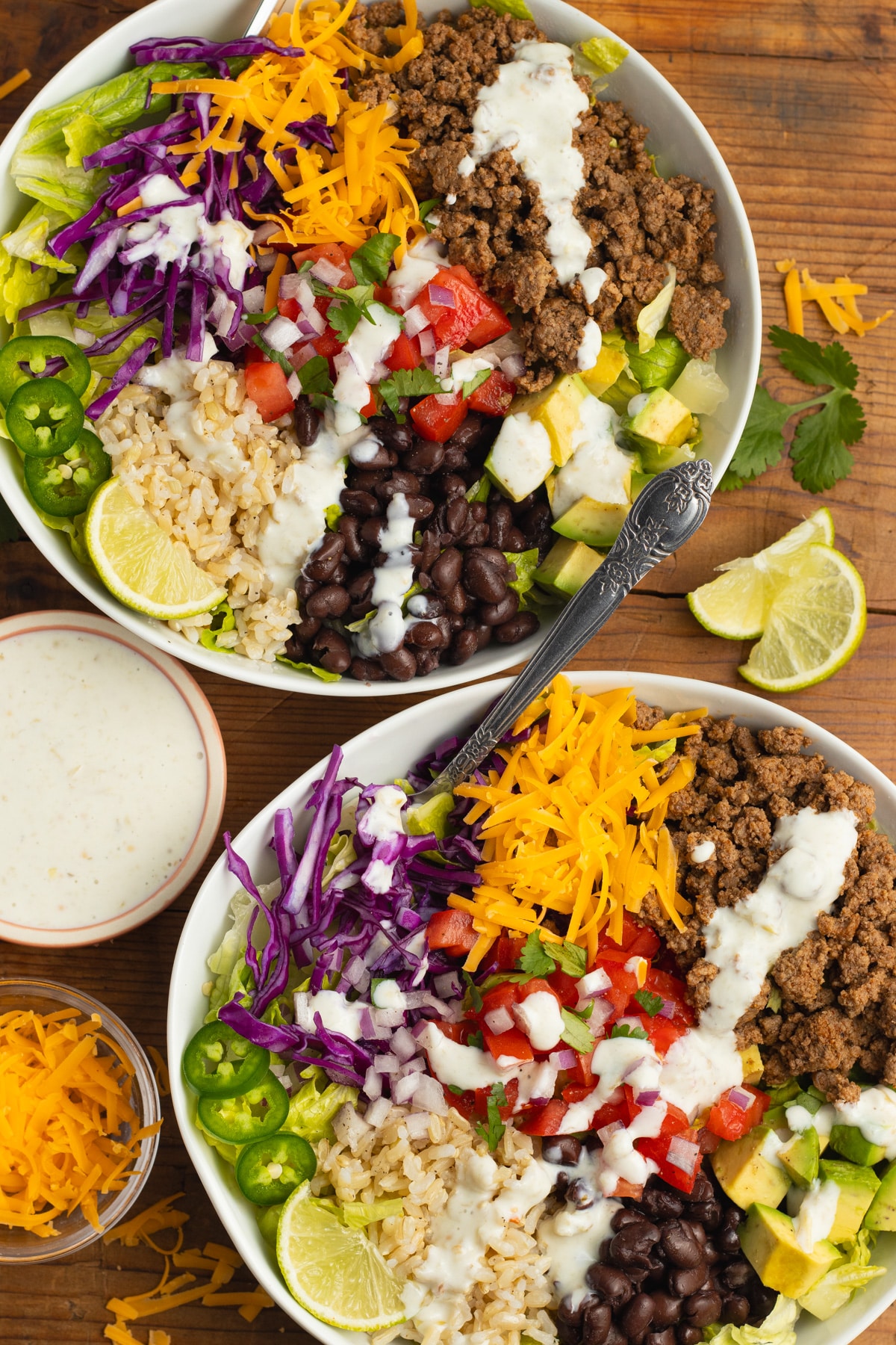 This is a picture of two beef taco bowls.
