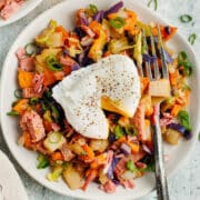 This is a picture of corned beef hash topped with a poached egg.