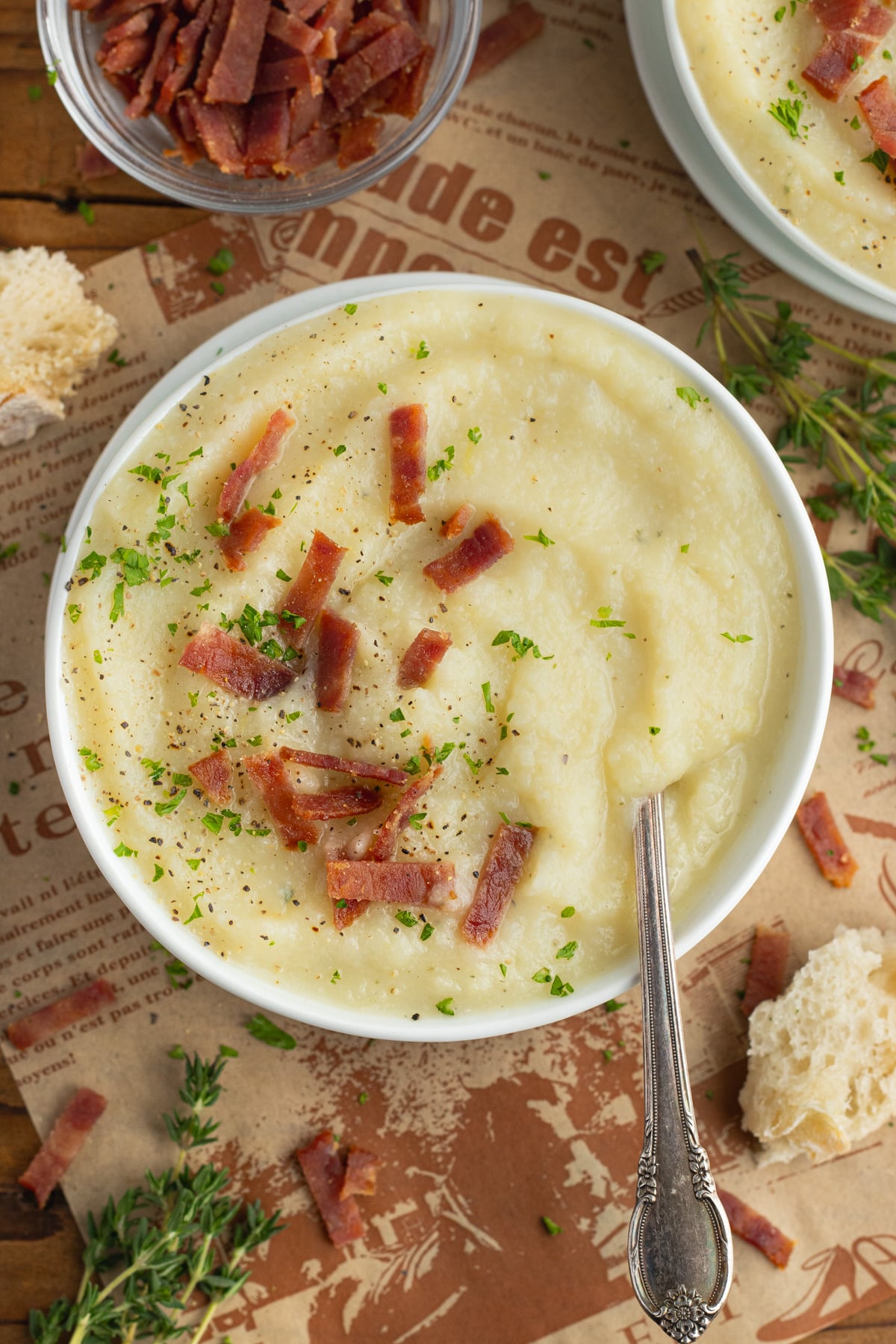 This is a picture of a bowl filled with potato cauliflower leek soup.