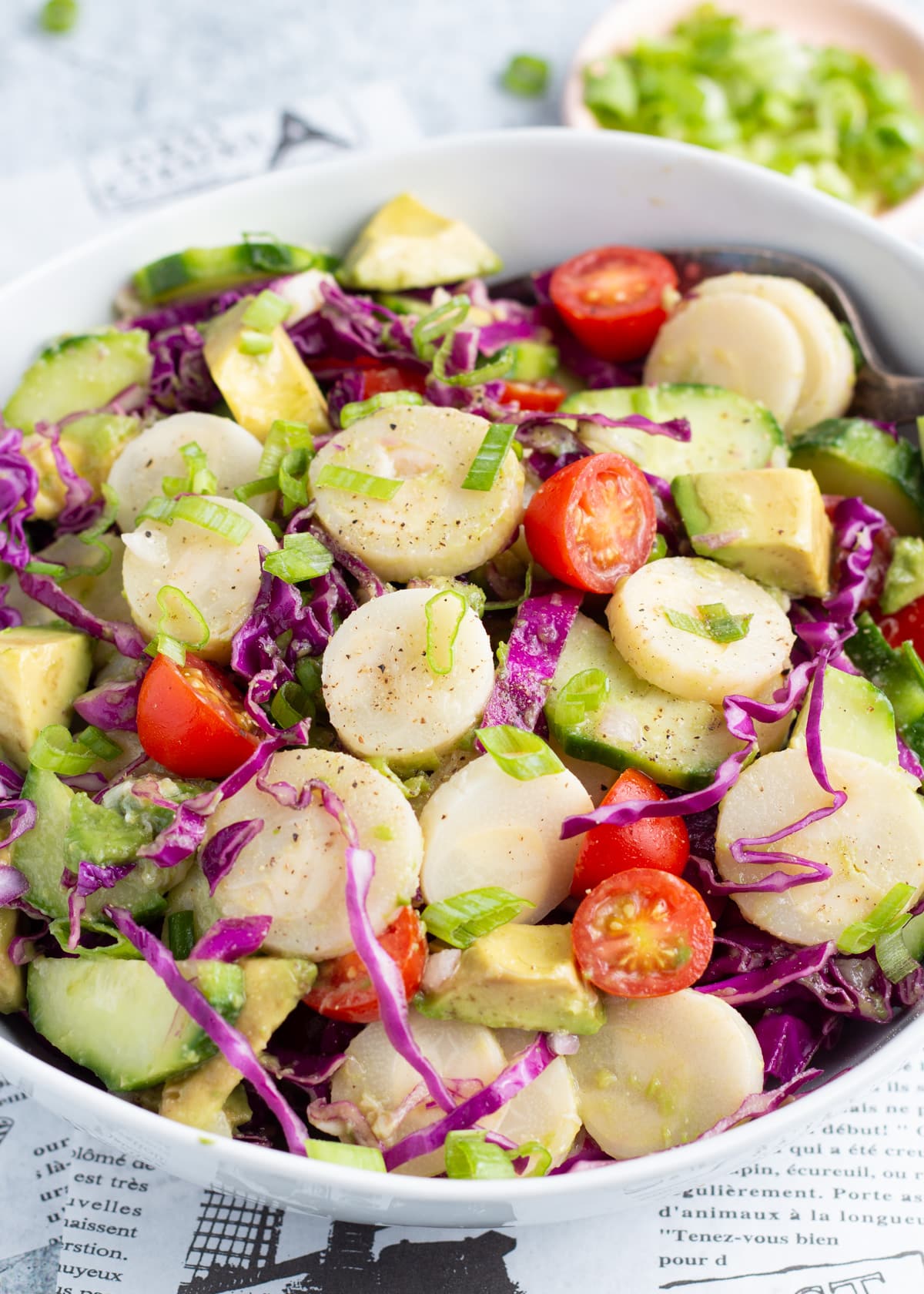 Close up picture of bowl with hearts of palm salad.