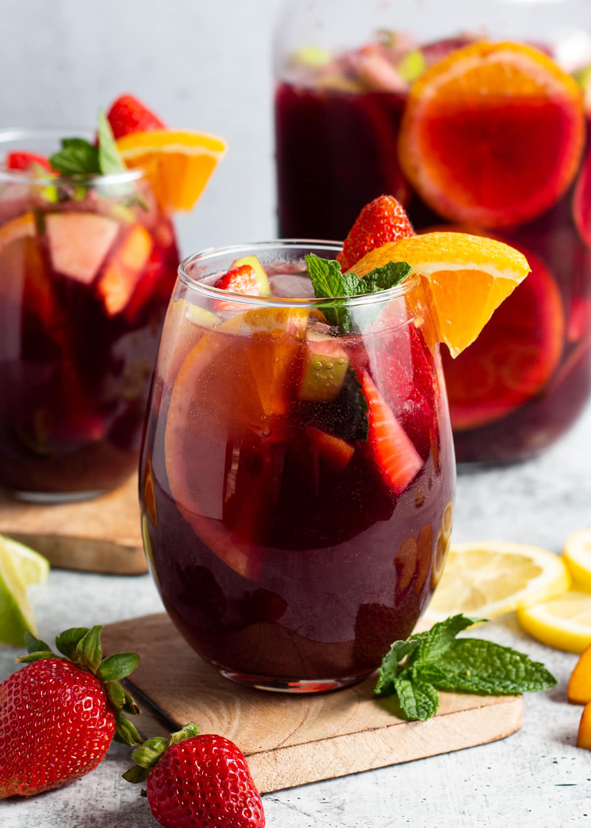 Picture of glass with sangria with fresh fruits.