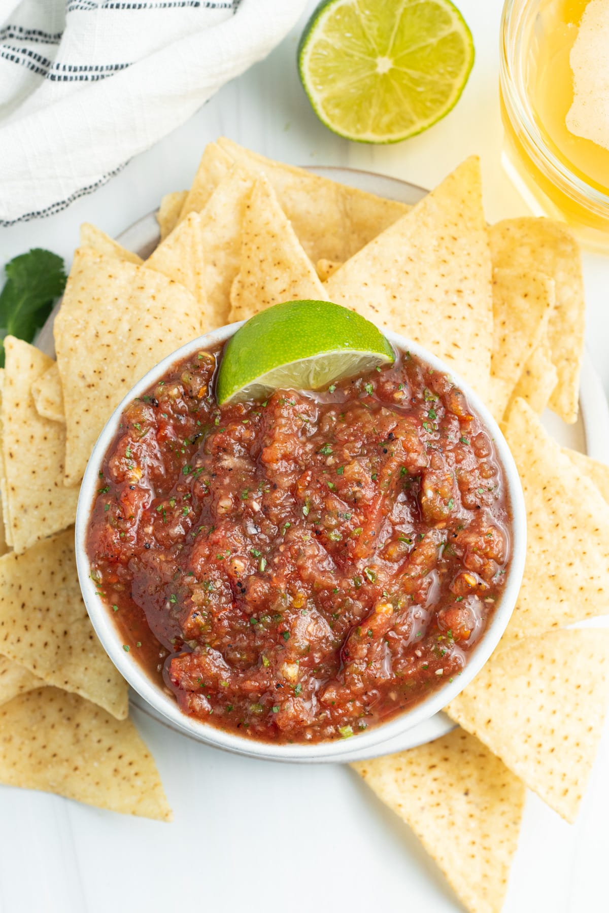 Picture of restaurant style salsa in a bowl and chips.