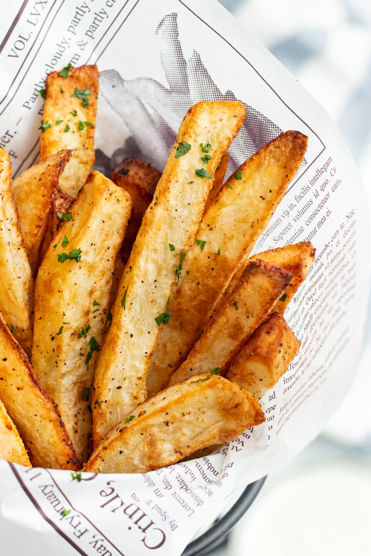 Close up view of cooked air fryer steak fries. 