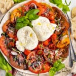 Picture of large plate with burrata salad.