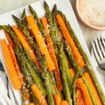 Square picture of roasted carrots and asparagus with parmesan.