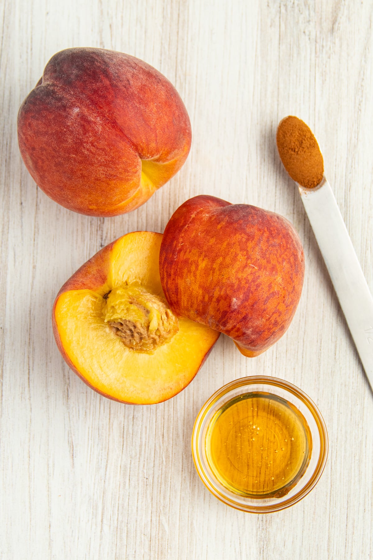 Picture of ingredients including peaches, honey and cinnamon.