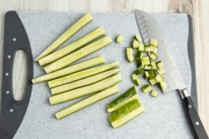 Picture of cucumber being diced.