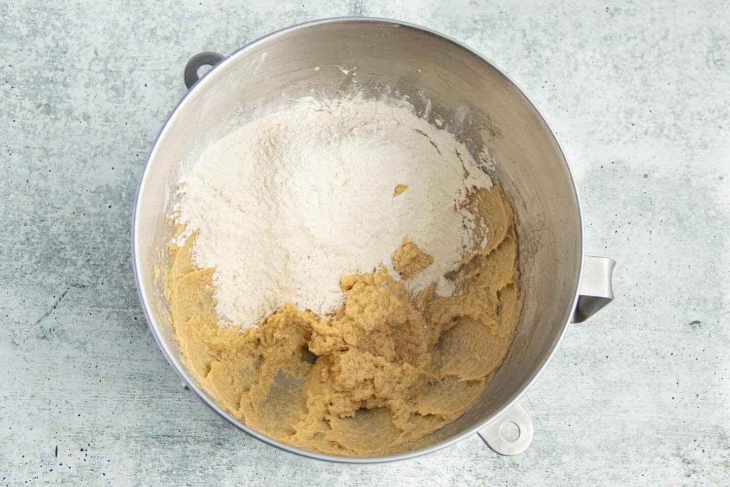 Picture of mixing bowl with flour added to wet mixture.