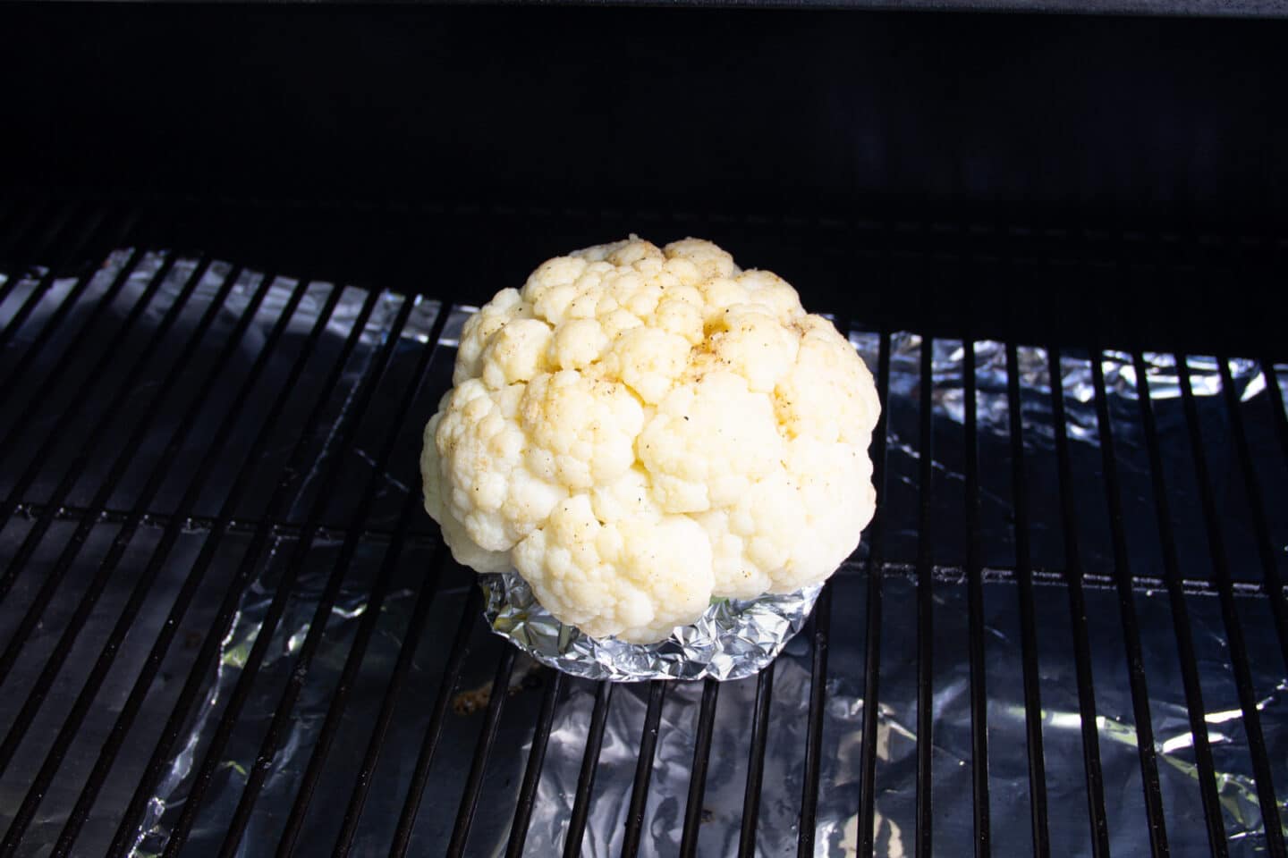 Picture of cauliflower on the smoker.