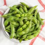 Picture of a bowl with air fryer edamame.