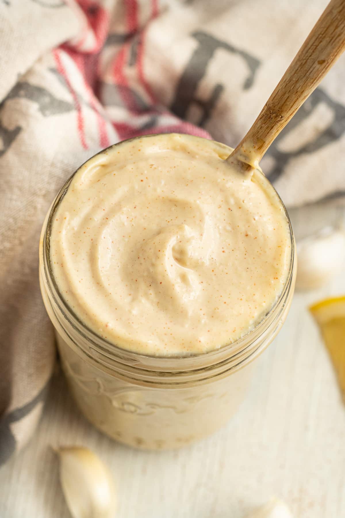 Picture of a jar full of Dijon aioli. 