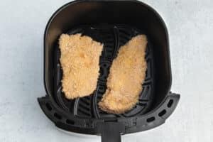 This is a picture of a chicken cutlets in the air fryer.