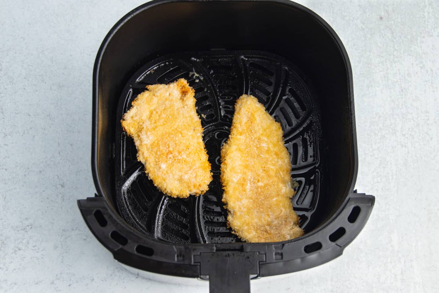This is a picture of a chicken cutlets cooked in the air fryer.