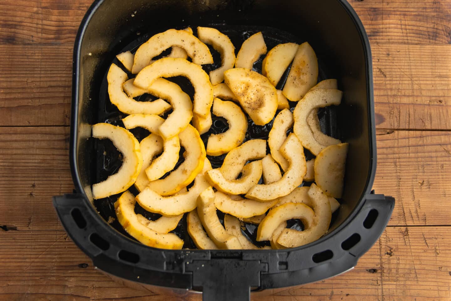 This is a picture of delicata squash in the air fryer.