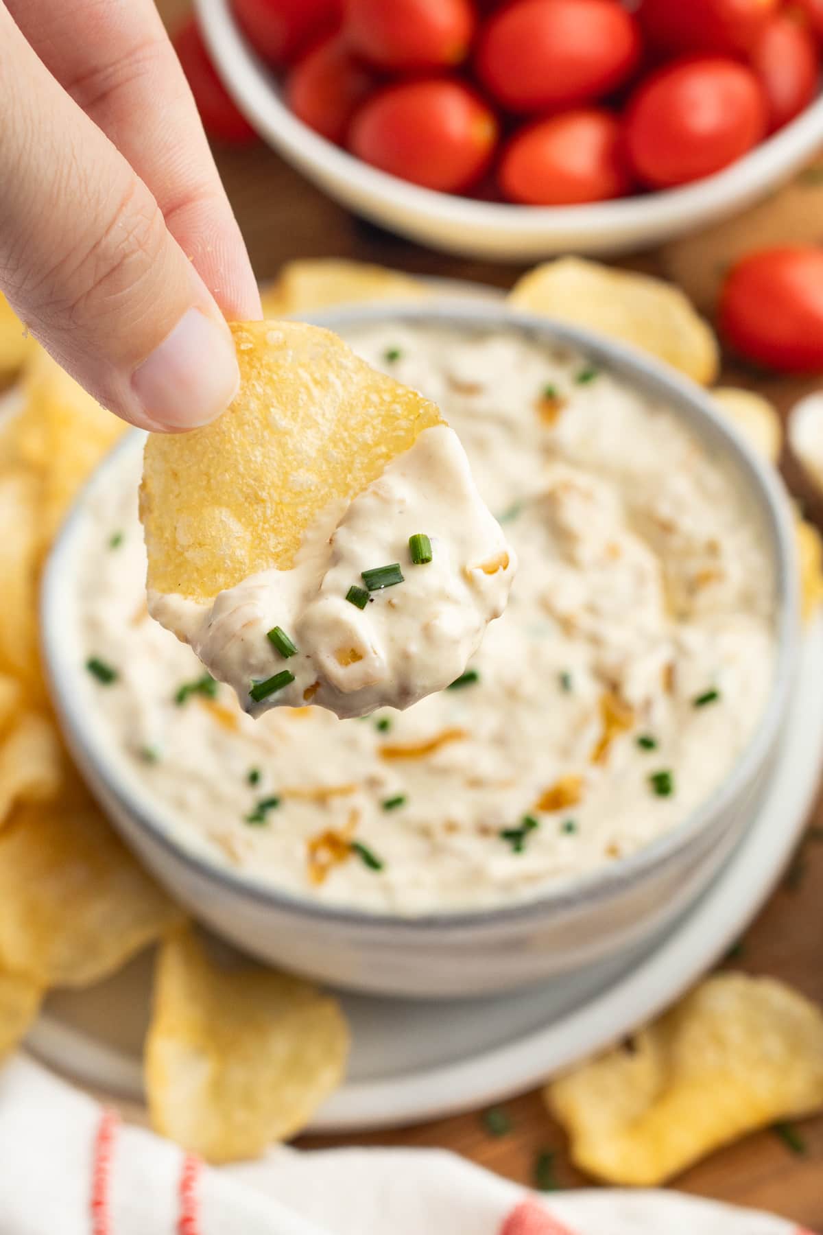 This is a picture of a chip with onion dip.