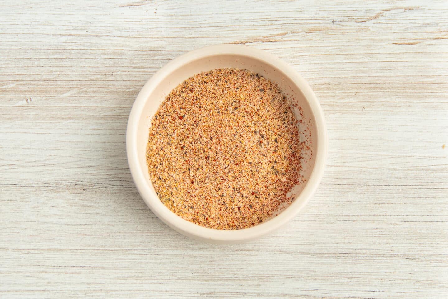 This is a picture of a little bowl with the spices mixed together.