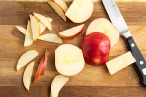 This is a picture of apples being sliced.