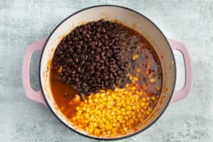 This is a picture of the pot with the the broth, black beans and corn added.