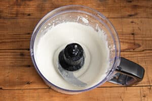 This is a picture of a blender with cottage cheese.