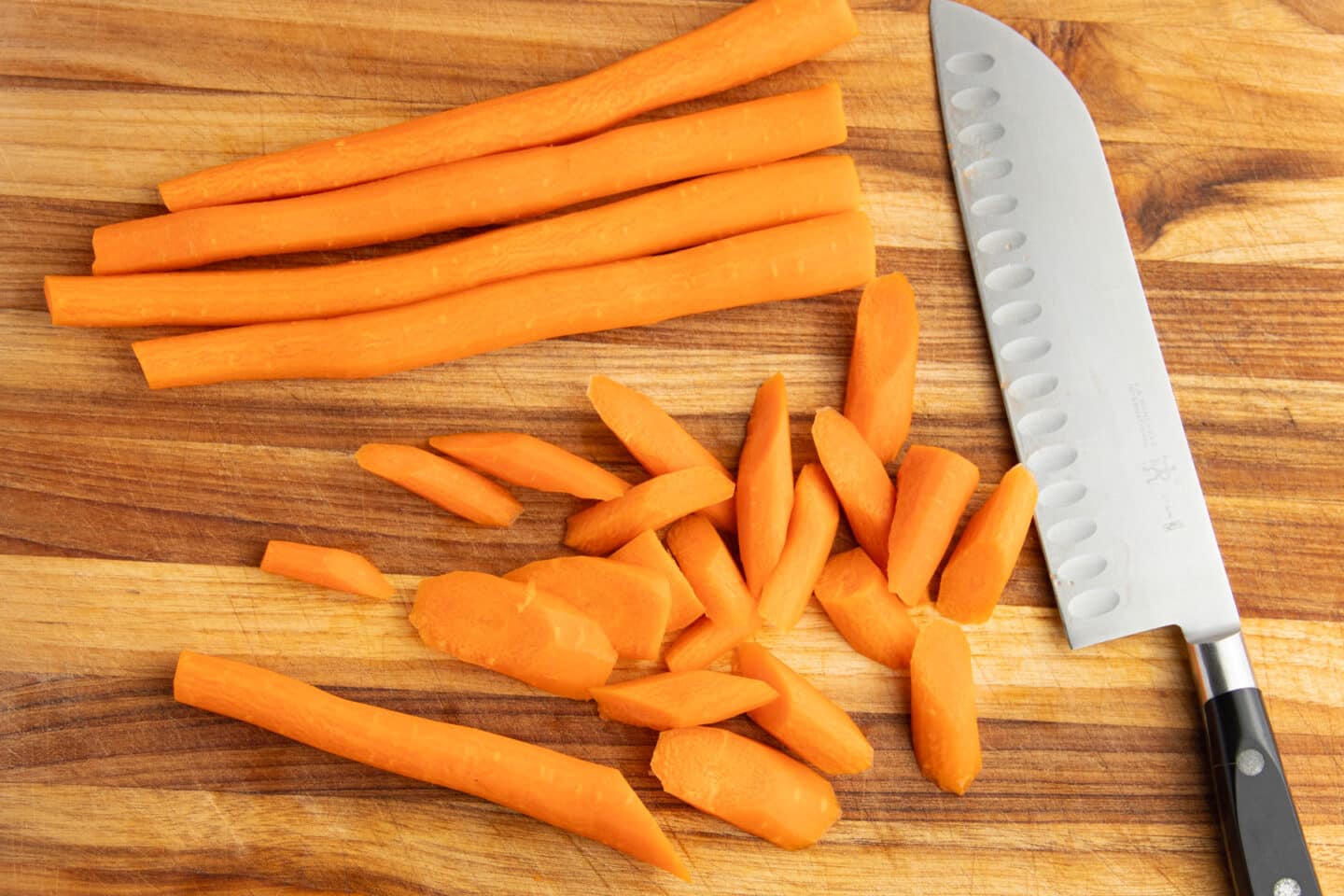 This is a picture of carrots being chopped.