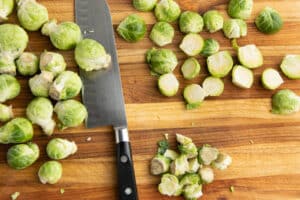 This is a picture of Brussels sprouts being chopped.
