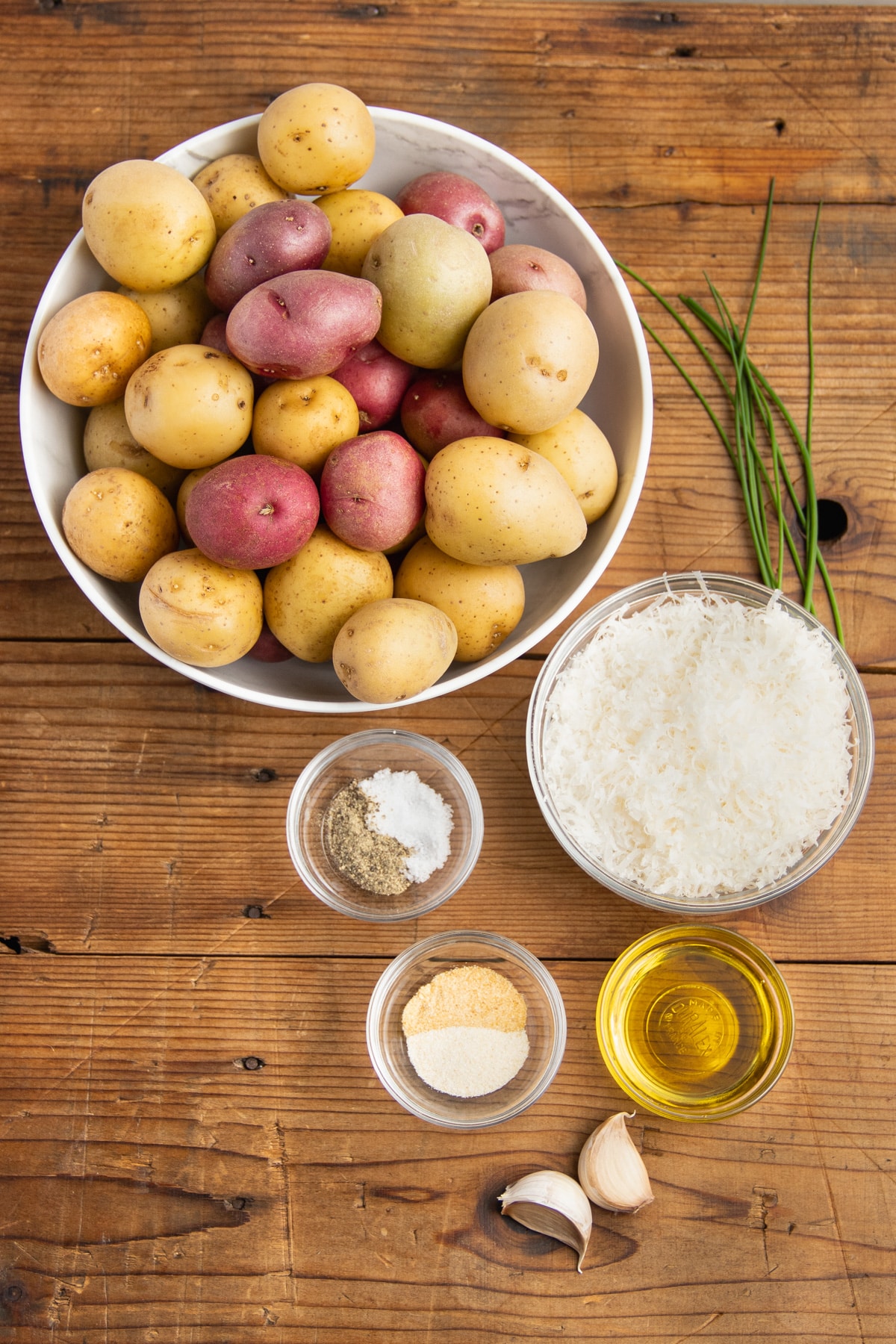 This is a picture of all the ingredients needed to make air fryer parmesan potatoes.