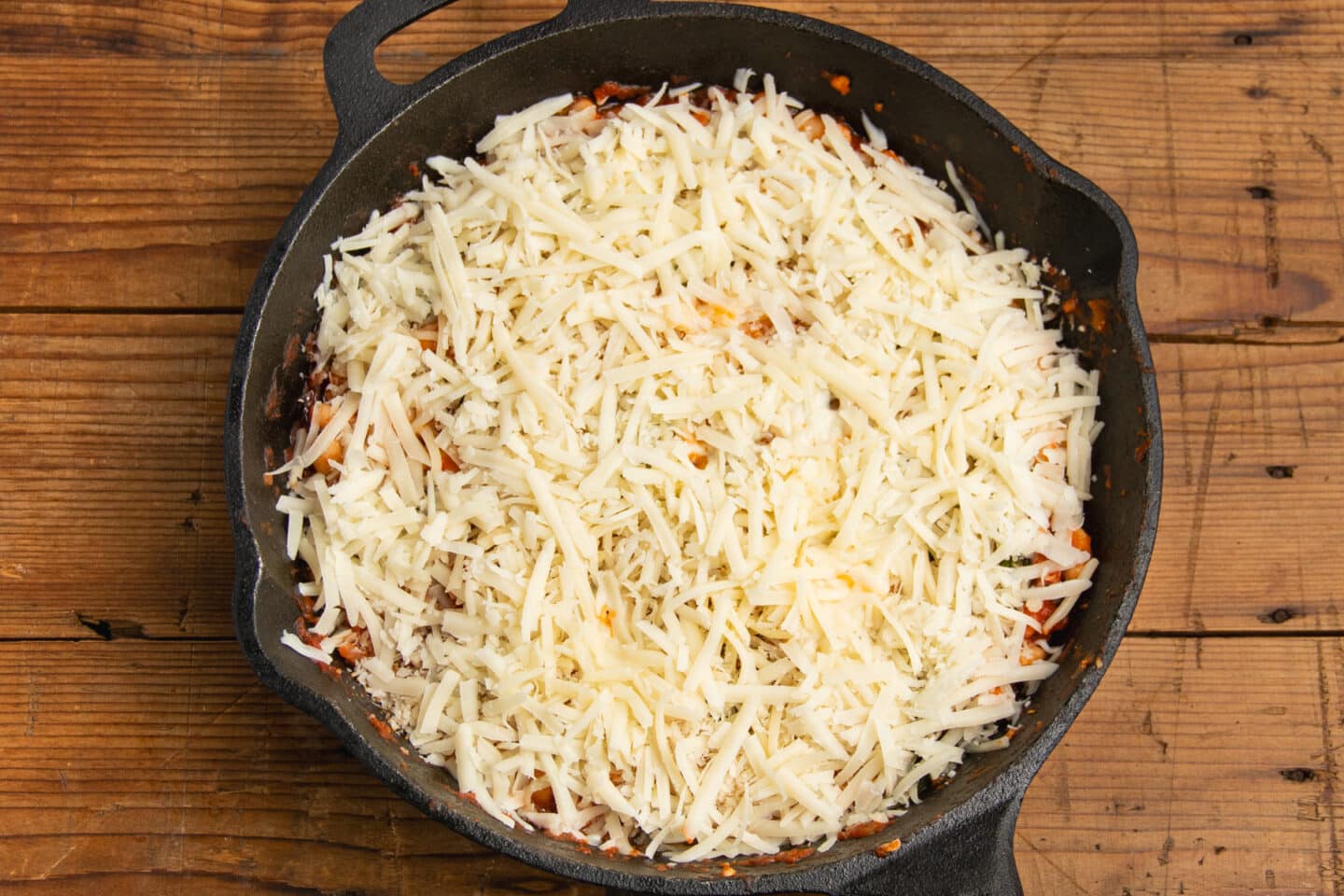 This is a picture of the skillet with the cheese added.