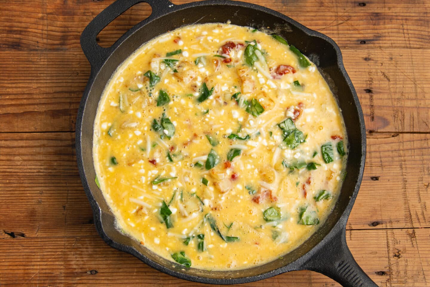 This is a picture of the skillet with added egg mixture.