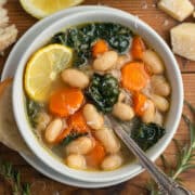 This is a square picture of the lemony white bean soup in a bowl.