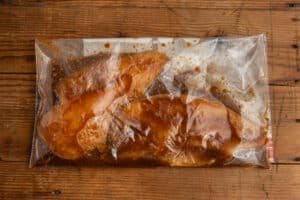This is a picture of the chicken marinating in a ziploc bag.
