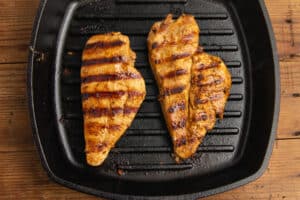 This is a picture of the chicken being grilled.