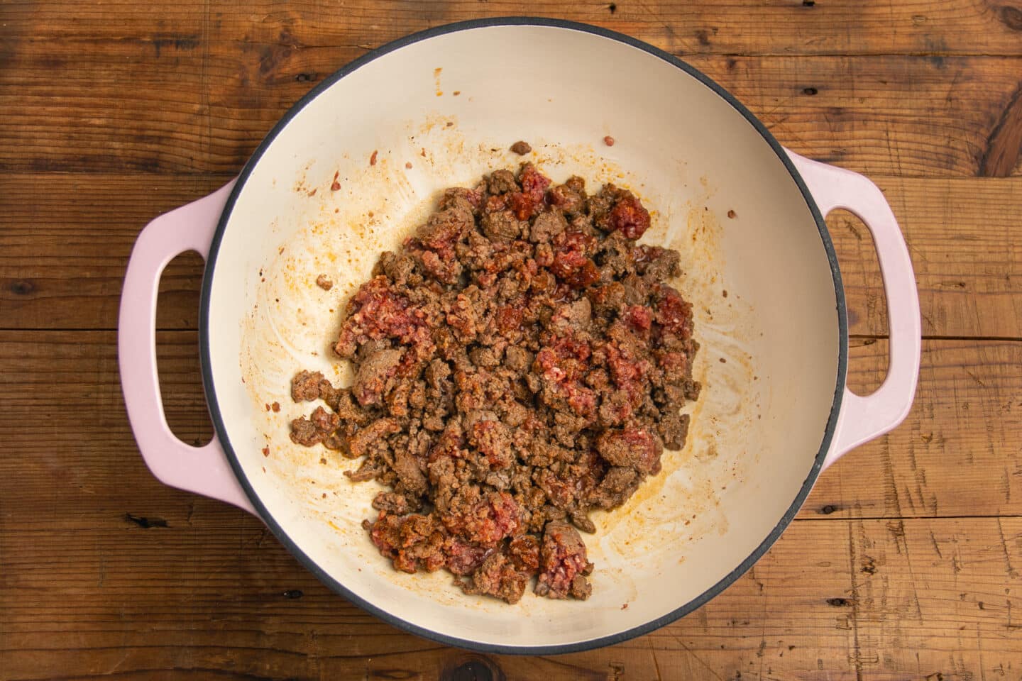This is a picture of a large pot with ground beef cooking.