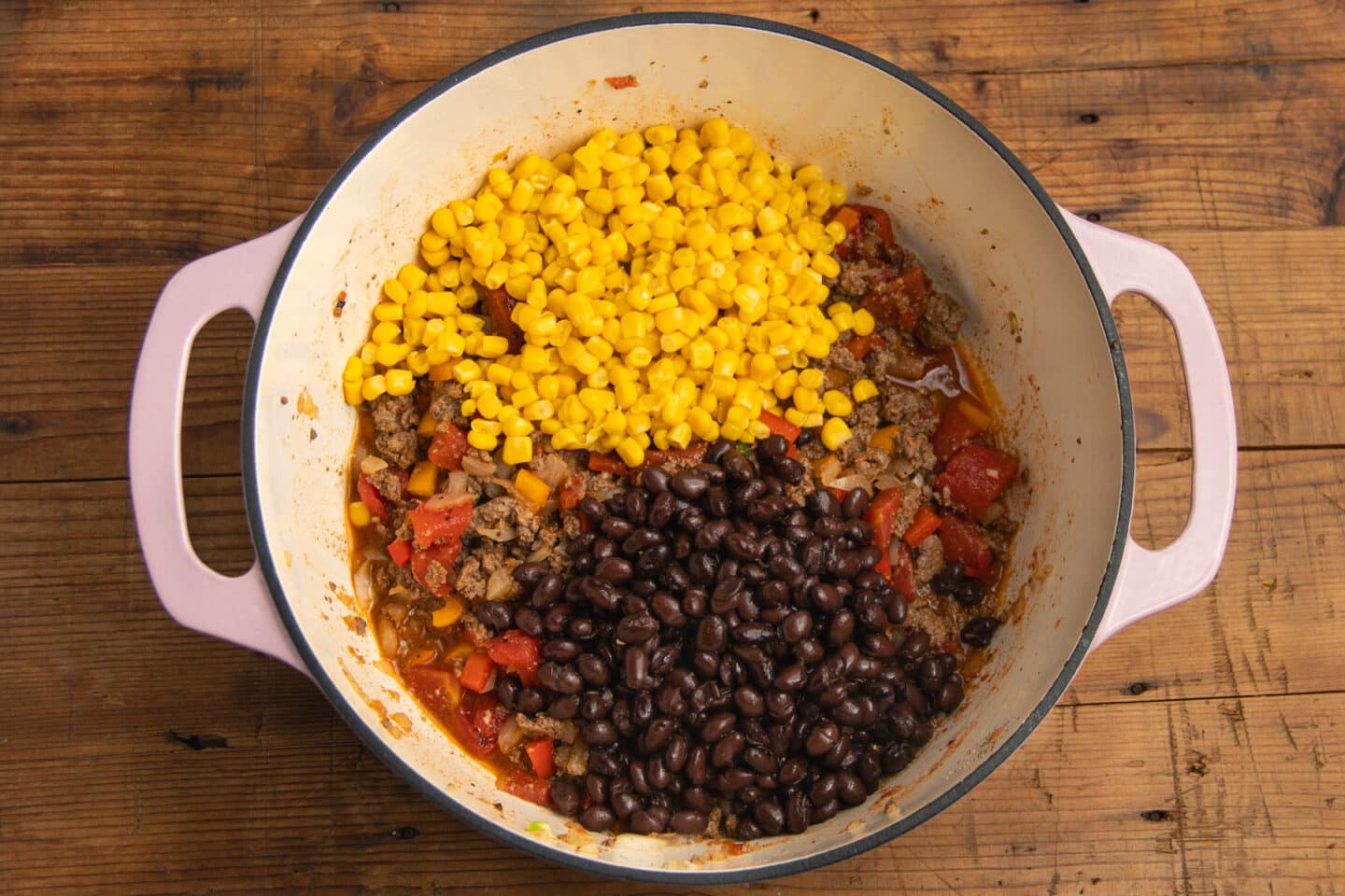 This is a picture of the pot with the corn and beans added to the soup.
