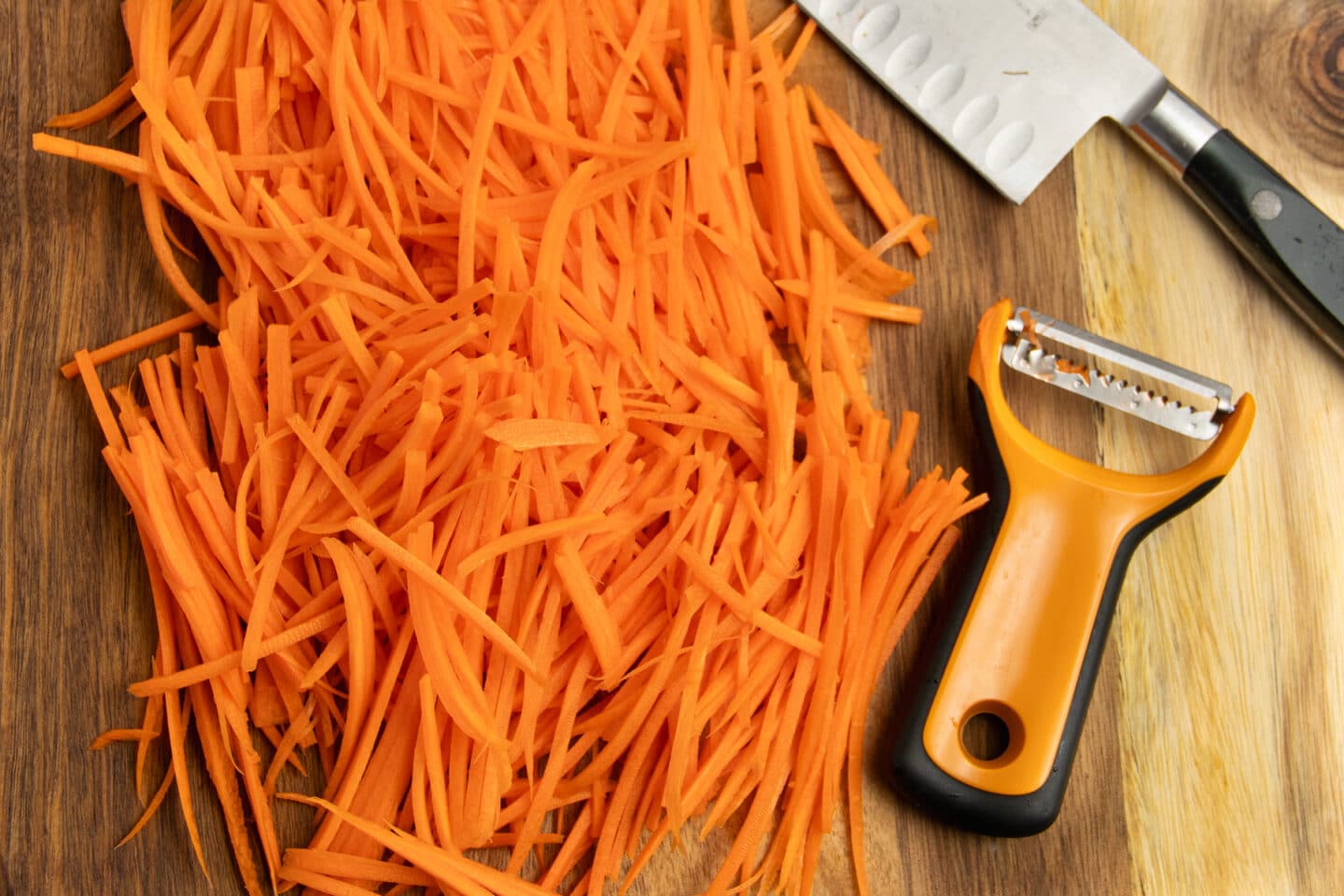 This is a picture of carrots being cut into matchsticks.