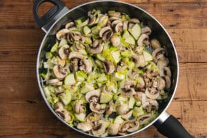 This is a picture of the vegetables being sautéed in a large skillet.