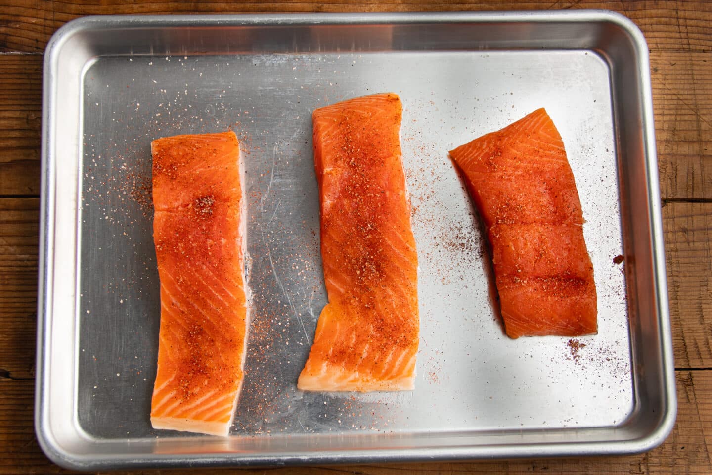 This is a picture of the salmon seasoned with paprika before cooking.