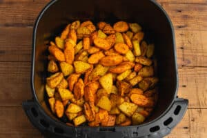 This is a picture of the veggies in the air fryer after cooking.
