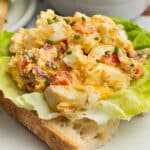 This is a square picture of cottage cheese egg salad on toast.