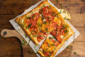 This is a picture of the goat cheese tomato puff pastry tart out of the oven.