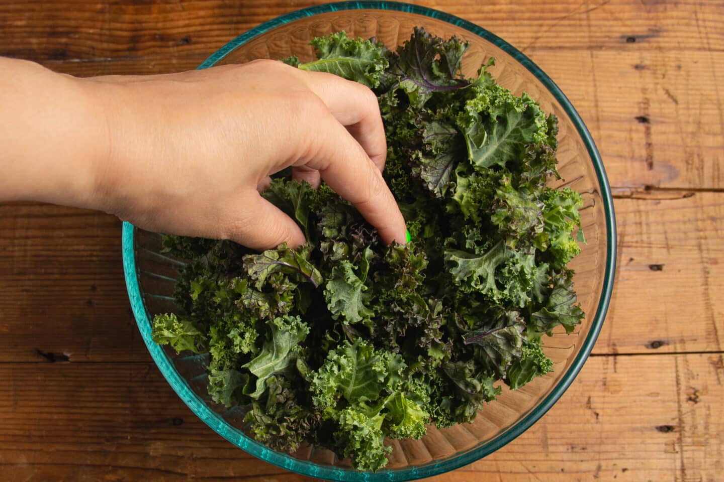 This is a picture of the kale being massaged.