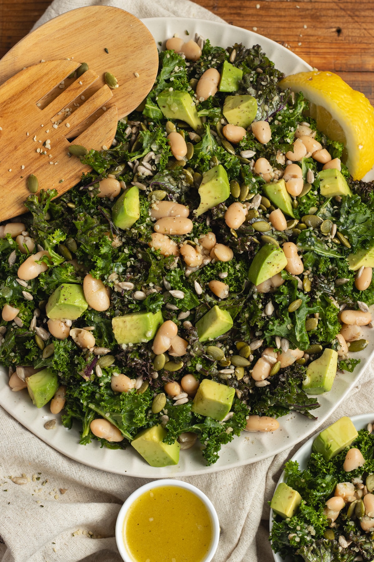 This is a picture of a large plate filled with kale bean salad.