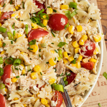 This is a picture of a large bowl filled with tuna corn pasta salad.