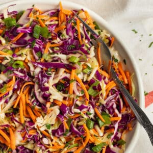 This is a square picture of this shredded cabbage and carrot salad recipe.