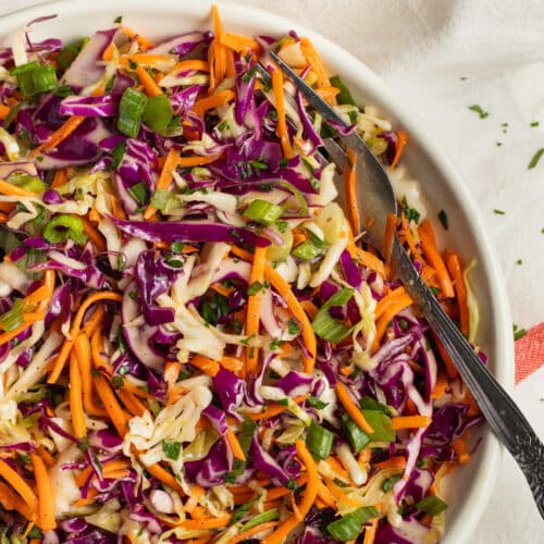 This is a square picture of this shredded cabbage and carrot salad recipe.