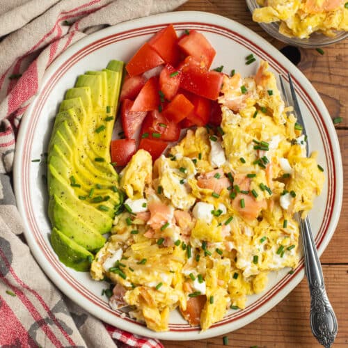 This is a square picture of a plate with smoked salmon breakfast scramble.