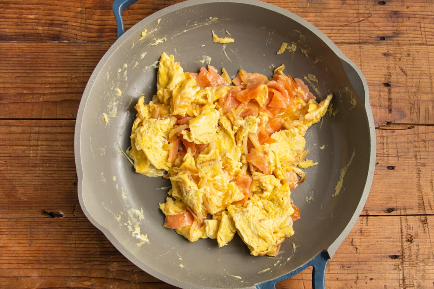 This is a picture of the scrambled eggs with smoked salmon added.