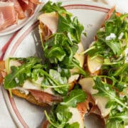 This is a square picture of the burrata crostini.