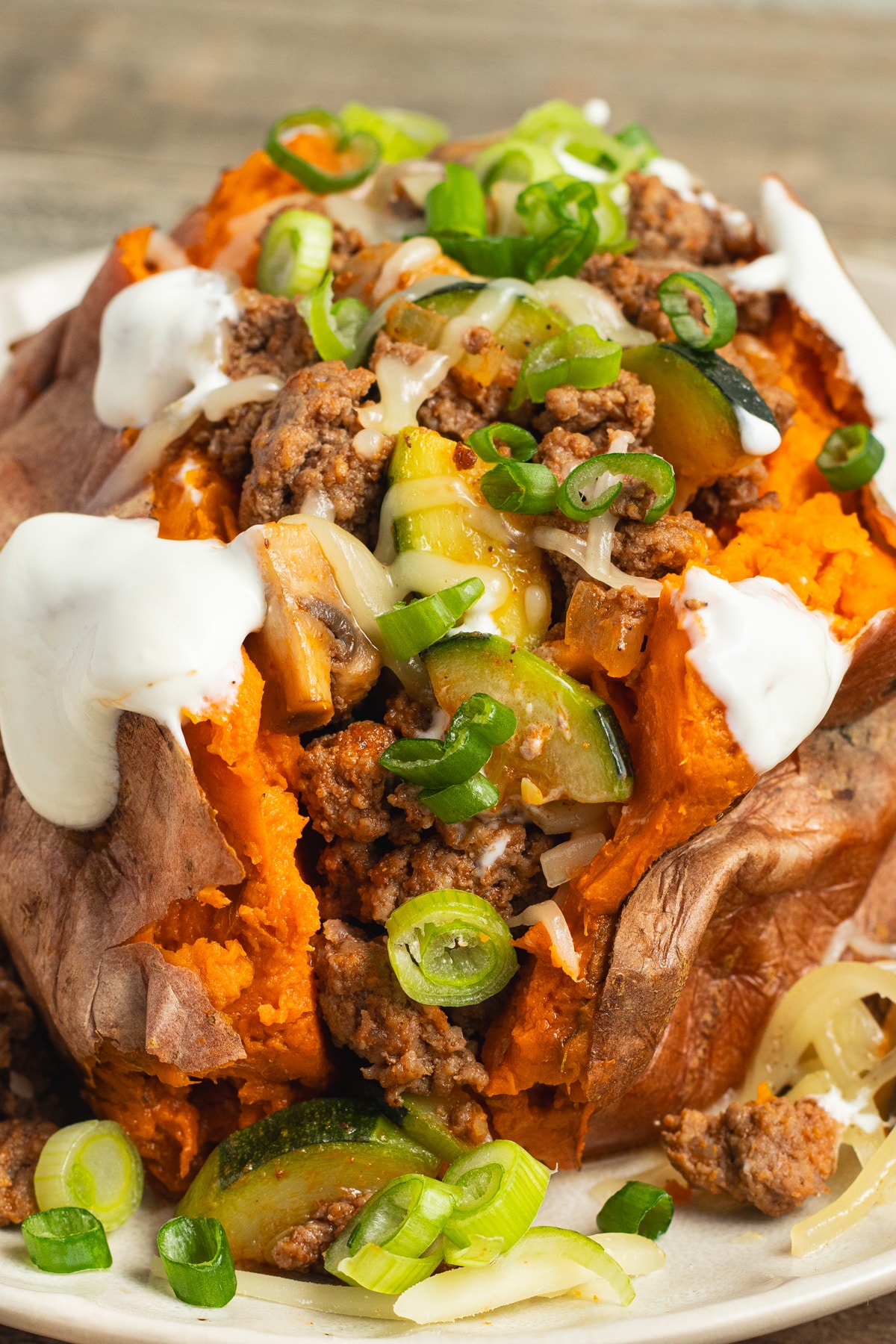 This is a picture of a stuffed ground beef sweet potato.